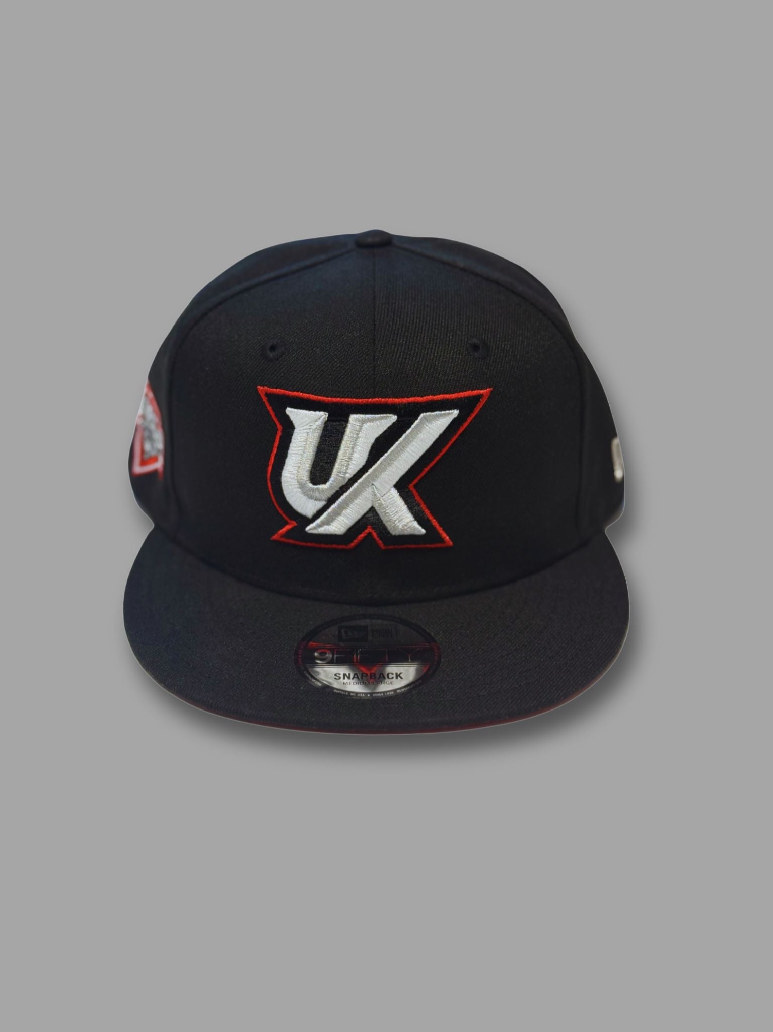 URBAN KNOWLEDGE X NEW ERA CHAMPIONSHIP EDITION ONYX/VARSITY RED/SILVER